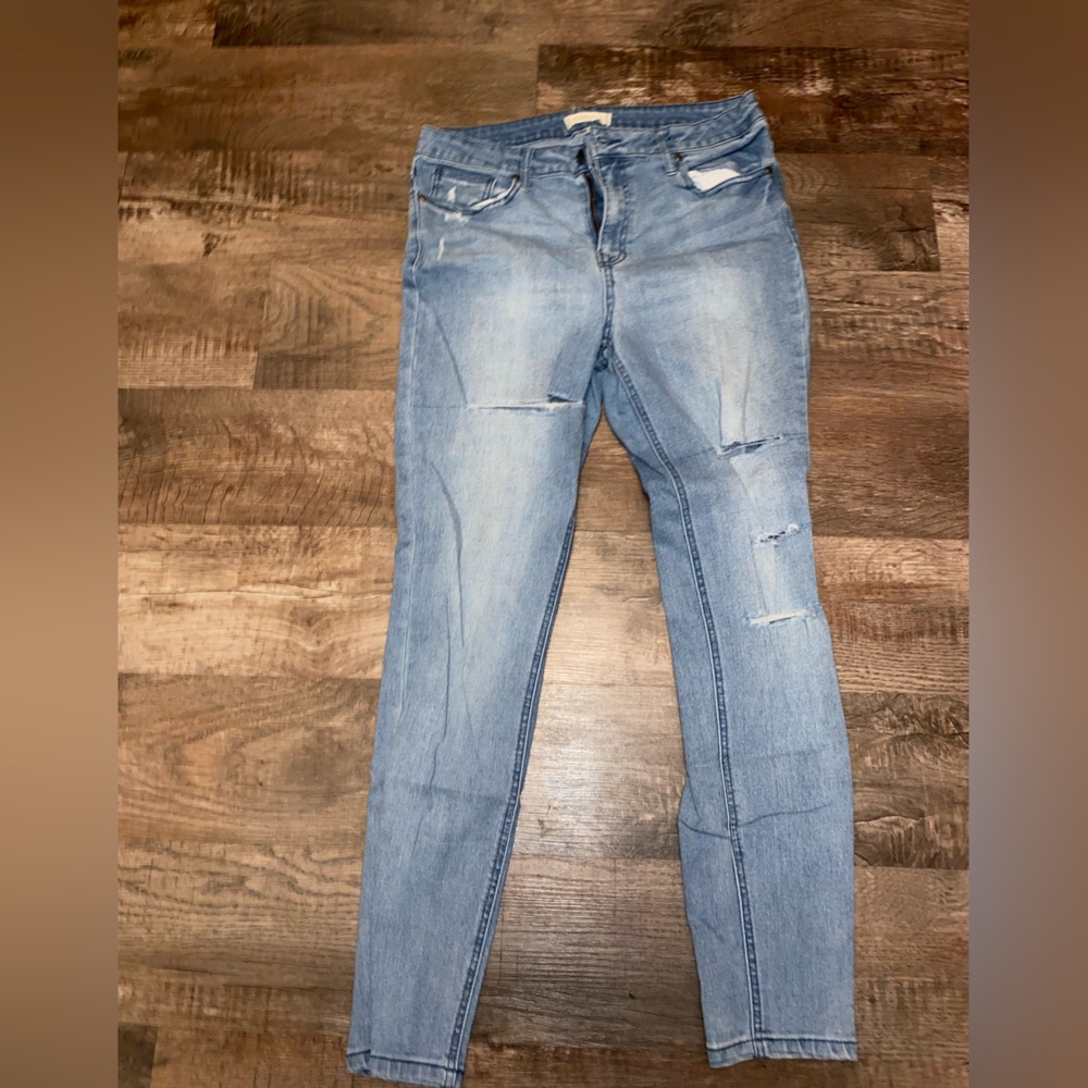 Mid rise stretch distressed jeans